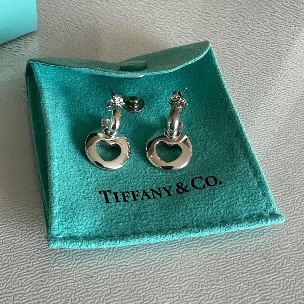 Vintage Tiffany & Co. Silver dangle cutout heart earrings.